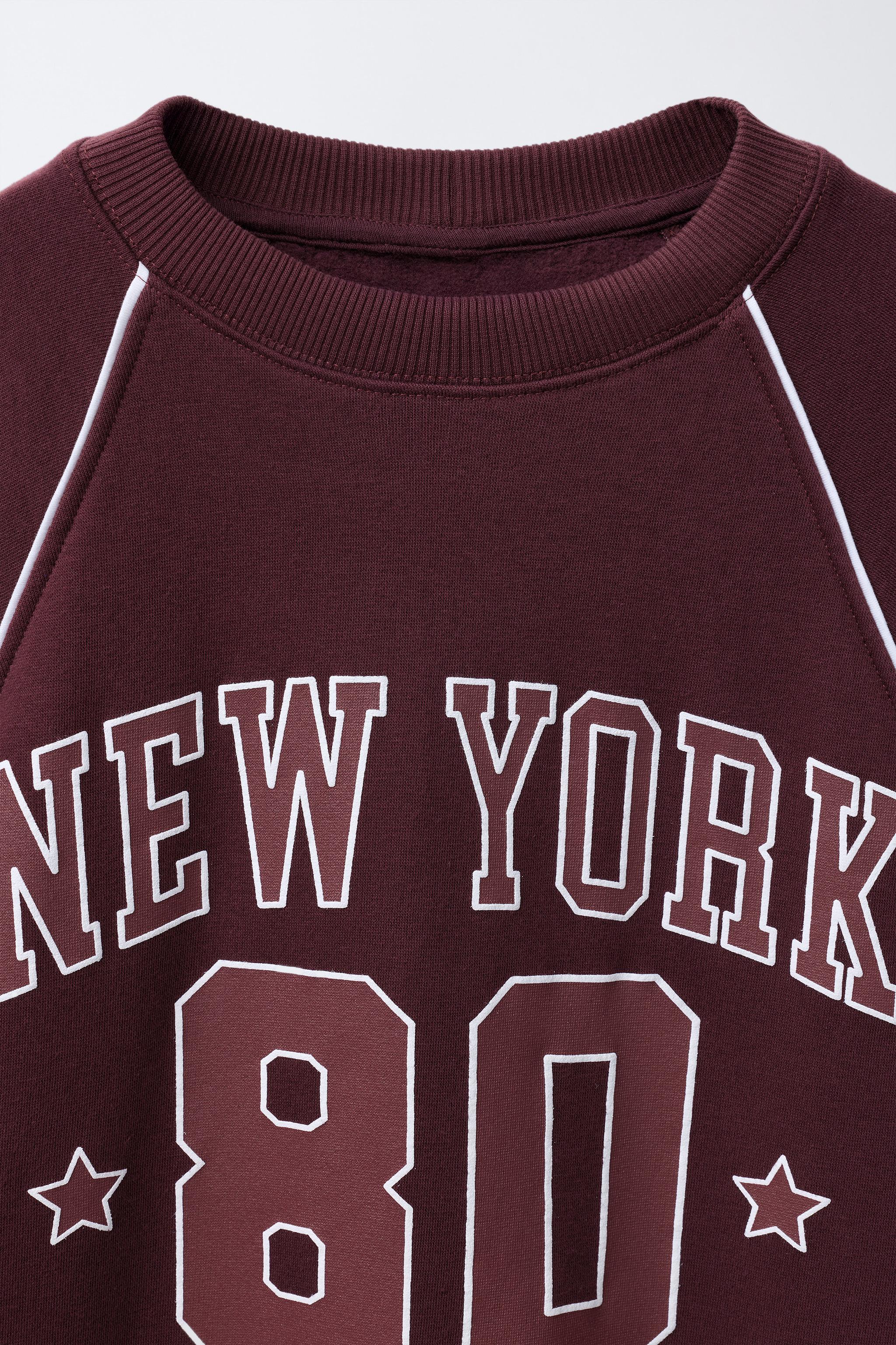 RAGLAN SLEEVE SWEATSHIRT WITH TEXT AND NUMBER